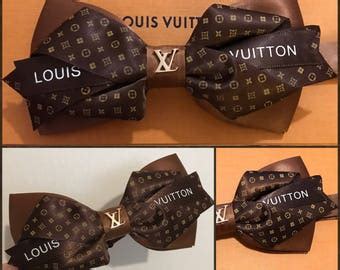 fake louis vuitton bow tie|Louis Vuitton counterfeit rings.